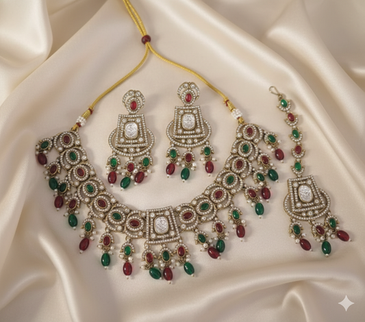 Elegant Kundan Jewellery Set with Ruby and Emerald Stones
